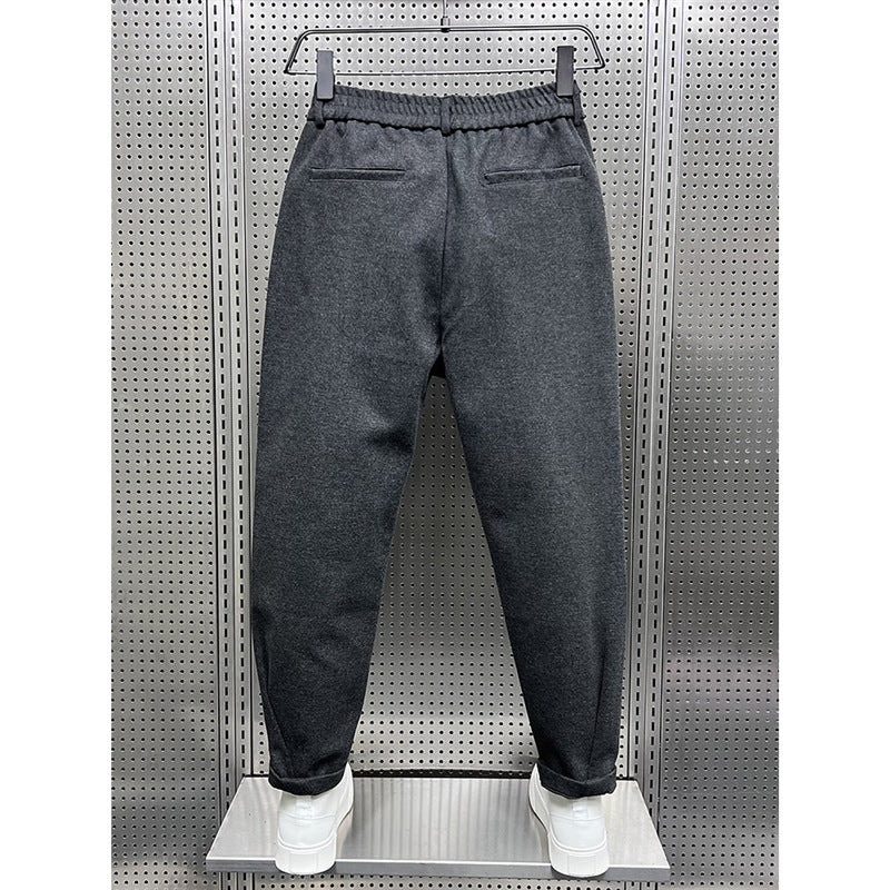 Pantalon ample en laine drapée pour homme, idéal pour l'automne et l'hiver.