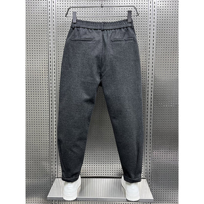 Pantalon ample en laine drapée pour homme, idéal pour l'automne et l'hiver.