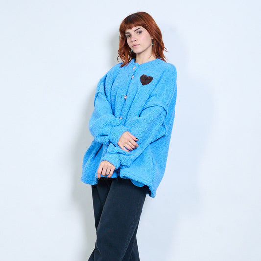 Gilet en polaire à boutons avec écusson cœur en gros - Nainette.fr