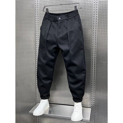 Pantalon ample en laine drapée pour homme, idéal pour l'automne et l'hiver.